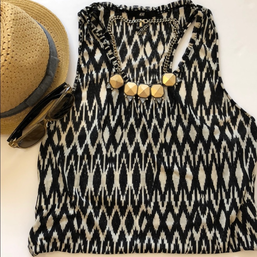 Vacation ready with this boho muscle tank.